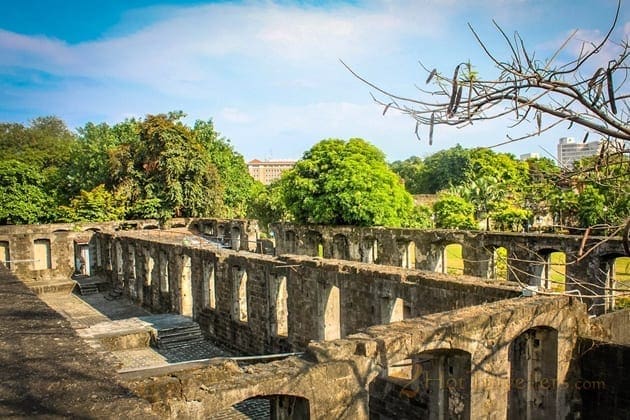 Fort Santiago citadel gate and moat in Intramuros, one of the essential things to do in Manila, where José Rizal was held before his 1896 execution.