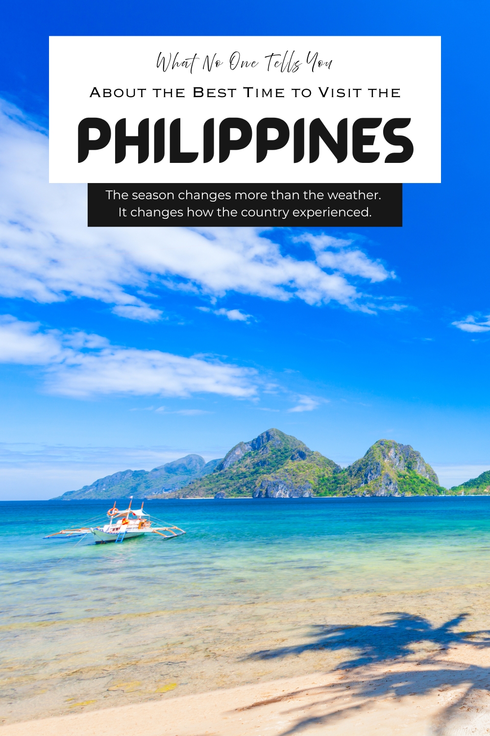 Best time to visit the Philippines beach view with clear water, island landscape, and traditional boat during dry season