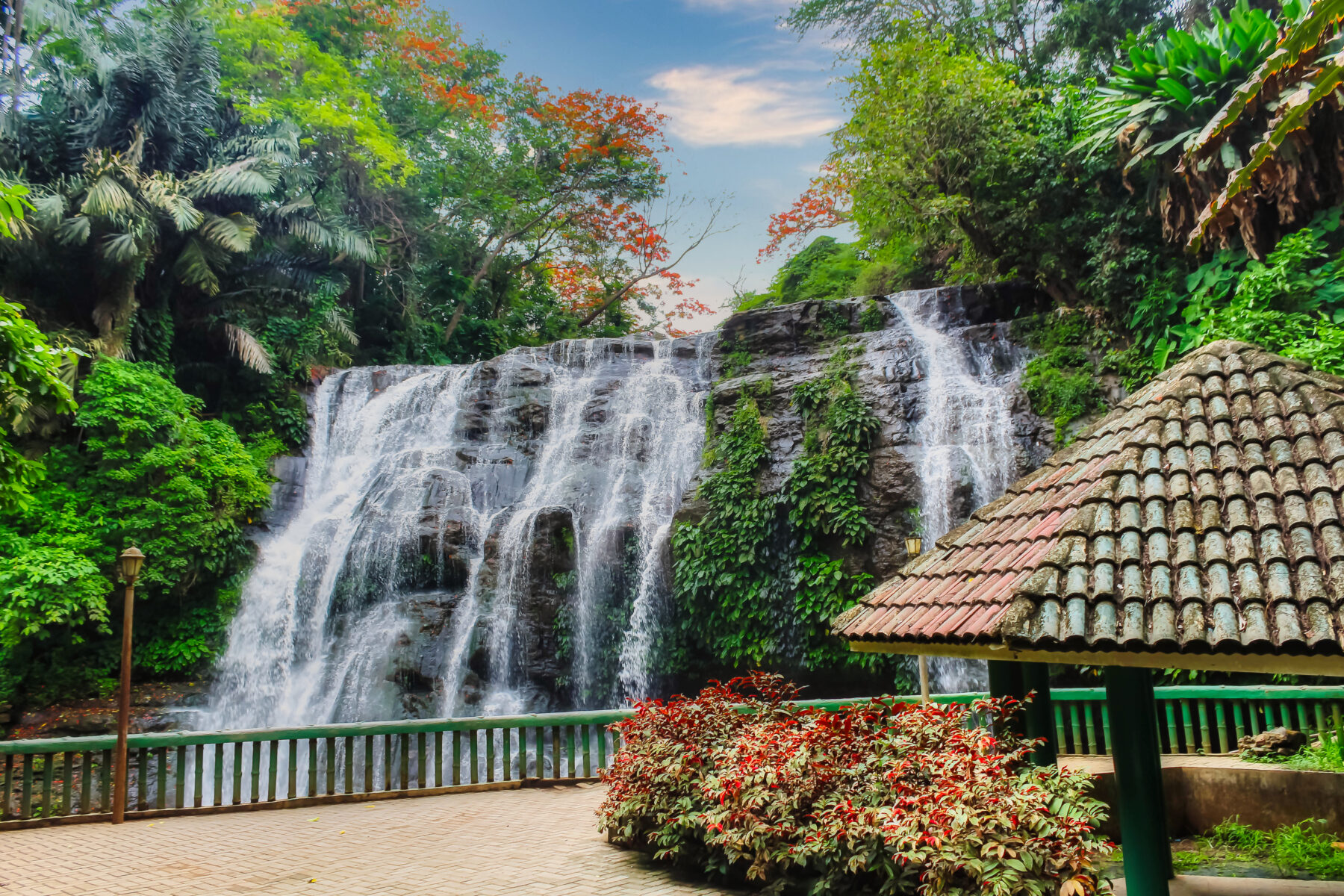 Hinulugang Taktak Falls viewed from the main viewing area with picnic cottage in Antipolo, Rizal