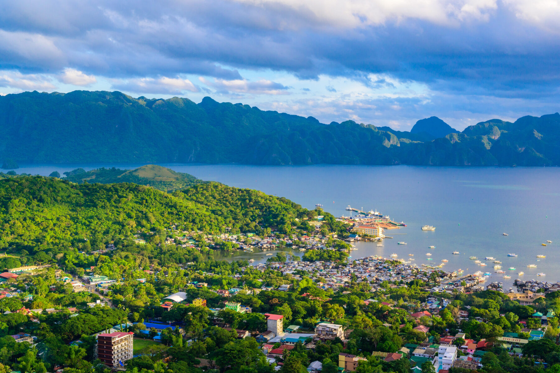 Coron town and bay view from Mount Tapyas Busuanga Island Philippines with coastal landscape and boats
