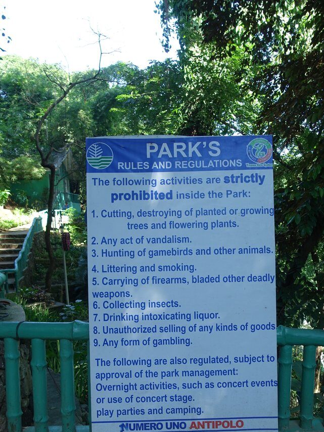Hinulugang Taktak Park rules and prohibited activities sign