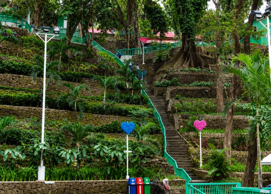 Stone terraces and stairway with heart decorations at Hinulugang Taktak Falls park, Antipolo, Rizal