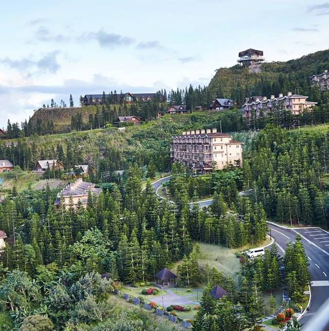 Tagaytay Highlands horizon with luxury condos and mountain view.