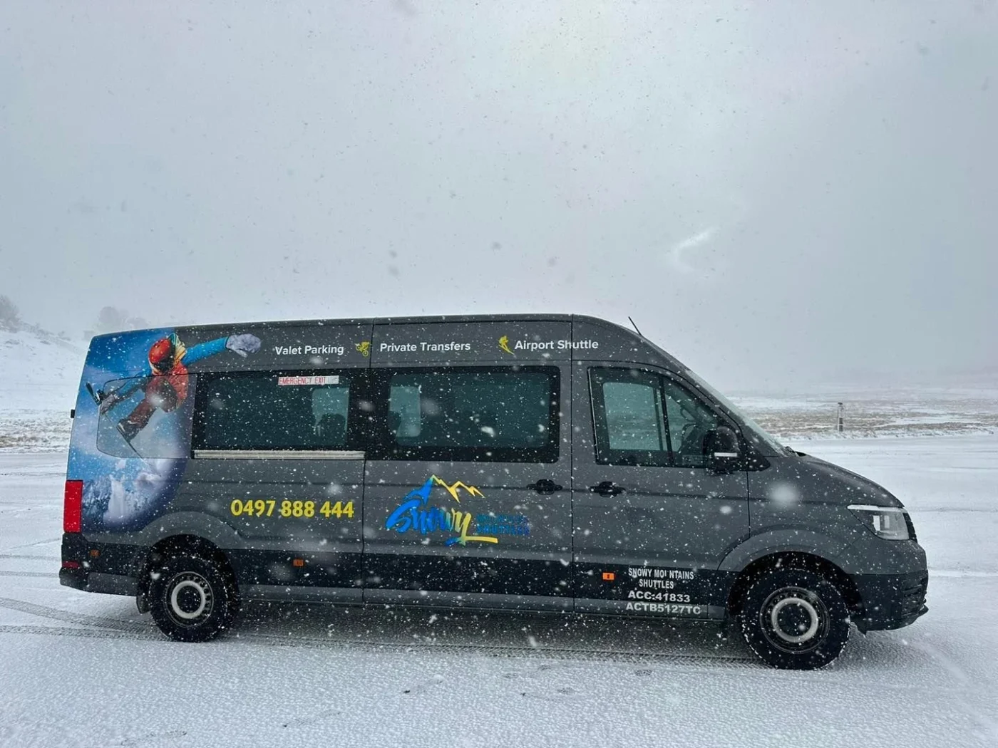 Snow shuttle bus travelling through the Australian Alps during winter