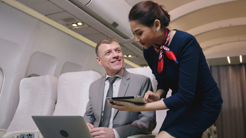 Flight Attendant Sending Digital tablet
