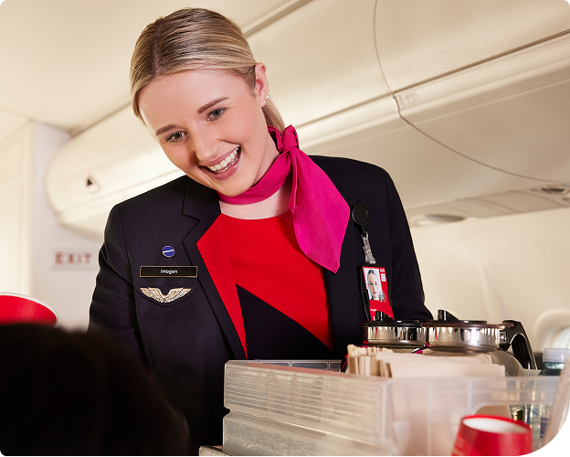 flight attendant life reality showing cabin crew serving passengers with trained composure and controlled behavior during service