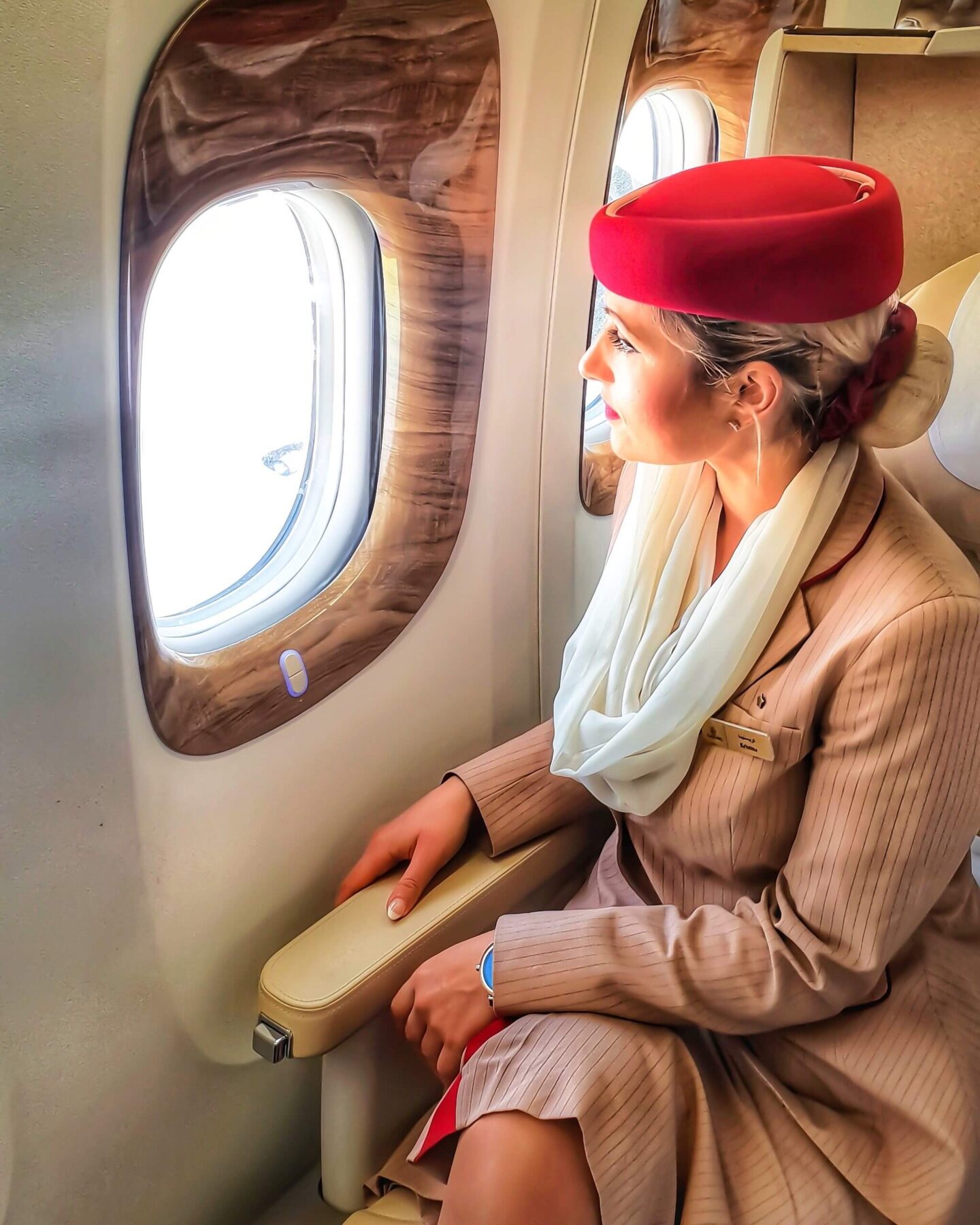 flight attendant sitting alone reflecting the emotional side of flight attendant life reality